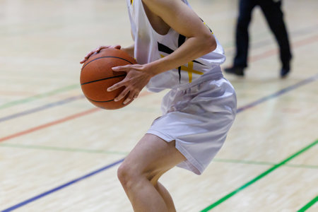 basketball game sport player in action isolated on white background in sports hall