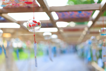 Wind chimes in the temple with blur background and bokeh.の写真素材