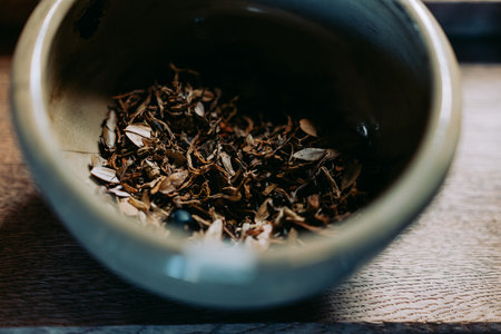 Tea leaves in a ceramic container