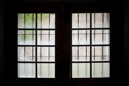 Wooden window with reflection in the water. Shallow depth of field.