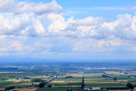 Beautiful view of the blue sky and white clouds over the countrysideの写真素材