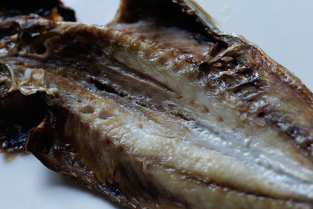 Dried horse mackerel on table