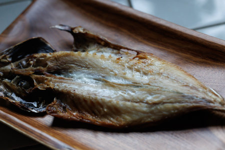 Dried horse mackerel on table