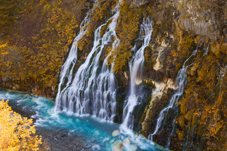 shirohige waterfall in autumn hokkaidoの写真素材