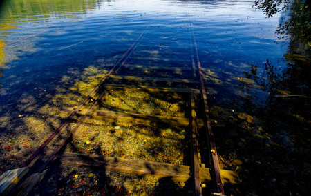rail road into the lakeの写真素材