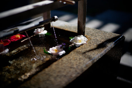 Japanese shrine decorated with flowersの写真素材