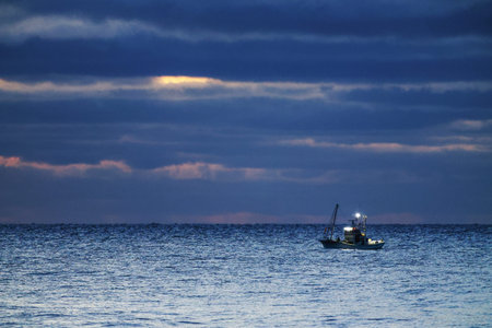 Winter seascape with fishing boats
