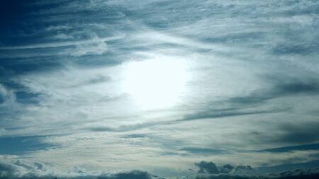 misty sky and sun at Naganoの写真素材