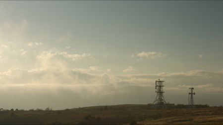 Steel tower and cloud stream at Takabocchikogenの写真素材