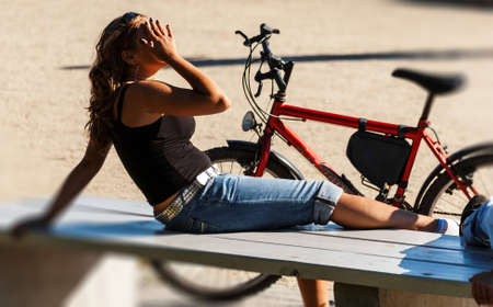 Young woman getting tannedの写真素材
