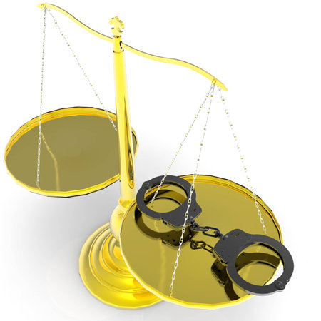 Scales of justice and handcuffs conceptの写真素材