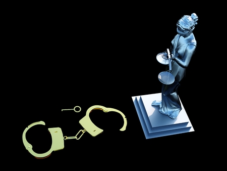 Lady of Justice  statue and handcuffsの写真素材
