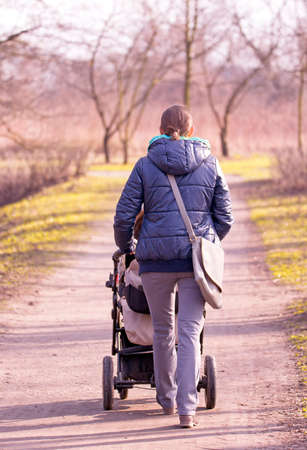 Young mother with  pram