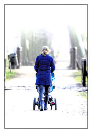Young mother with  pram