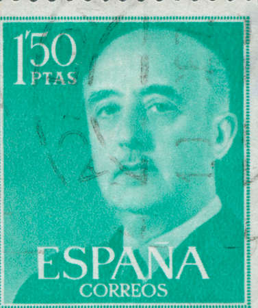 SPAIN - CIRCA 1949: Stamp printed in Spain showing a portrait of General Francisco Franco (1892-1975), series Francisco Francoのeditorial素材