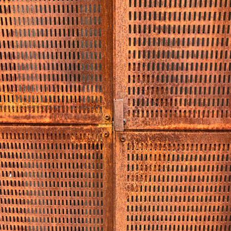 Perforated brass plate natural background