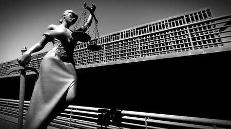 Prison bars and a hallway 3d renderingの写真素材