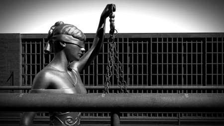 Prison bars and a hallway 3d renderingの写真素材