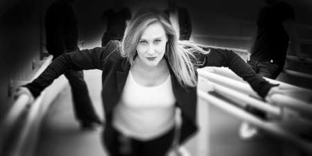 Beautiful caucasian female singer posing for promotional materialの写真素材