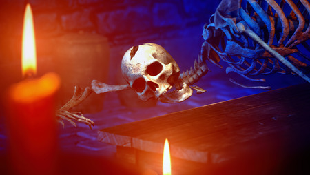 Human skeleton in medieval dungeon 3d renderingの写真素材