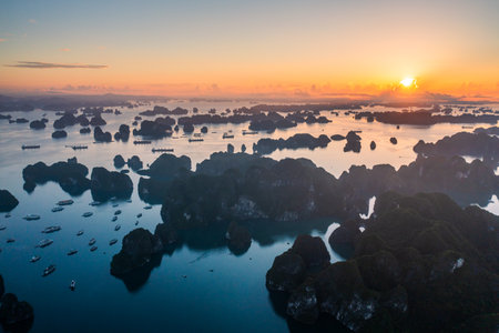 Sunset over the sea with rocks in Krabi, Thailand.