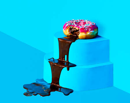 Melted chocolate comes out from a donutの写真素材