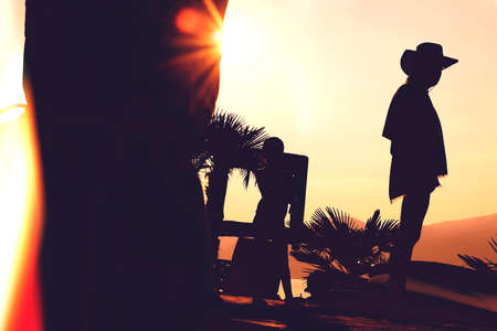 A man with hat with sun raysの写真素材