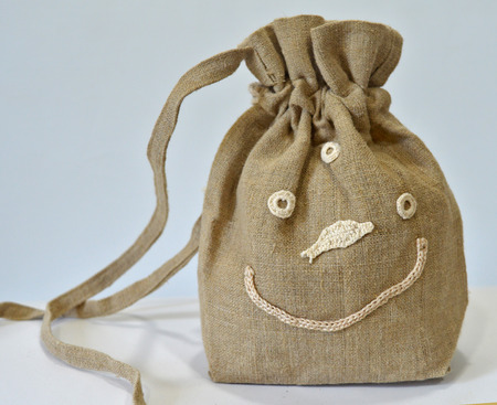 Retro handmade natural flax purseの写真素材