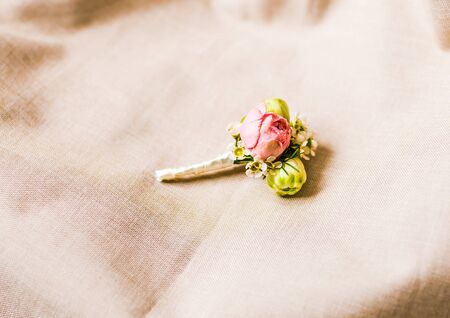 Beautifull white rose boutonniere flower. wedding boutonniereの写真素材