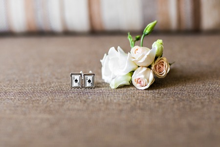 Wedding details, beautiful cufflinks, beautiful boutonniere, men's detailsの写真素材