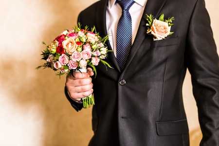 Close-up shot of a man dressed in formal wear .Groom's suitの写真素材