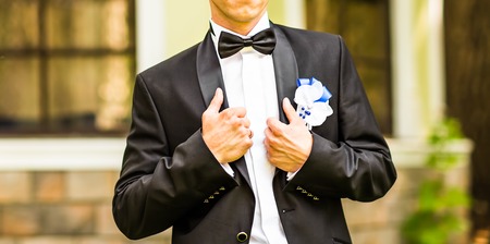 Close-up shot of a man dressed in formal wear .Groom's suitの写真素材