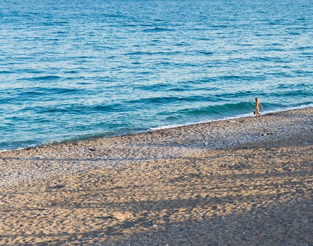 different people on the beach in Istanbulの写真素材