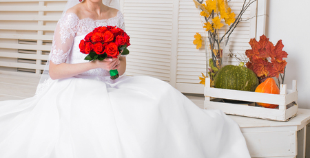 wedding bouquet and a beautiful young  brideの写真素材