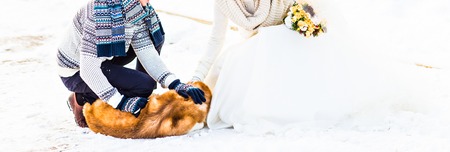 Husky dog  playing with  man and  womanの写真素材