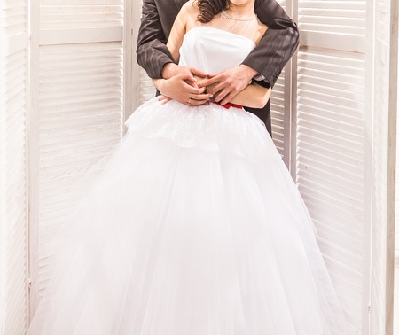 Happy bride and groom on their weddingの写真素材