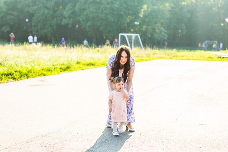 Happy Mother and daughter in the parkの写真素材