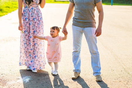 Happy Young Mixed Race Ethnic Family In The Park.の写真素材