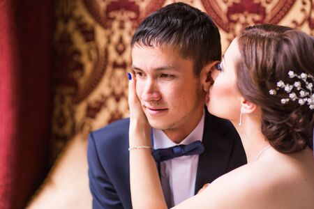 sensual happy married couple in restaurant. Weddingの写真素材