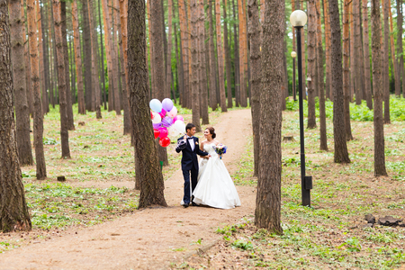 Couple of bride and groom with balloons. Wedding dayの写真素材