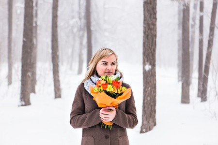 portrait of a young woman in winter parkの写真素材