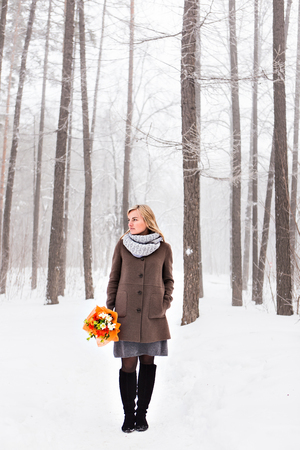 portrait of a young woman in winter parkの写真素材