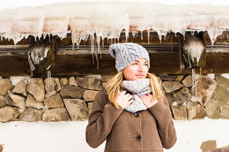 portrait of a  young woman near the house of Santa Clausの写真素材