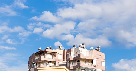 A solar panel used to heat water on a roofの写真素材