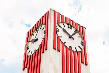 street big clock on the sky background.