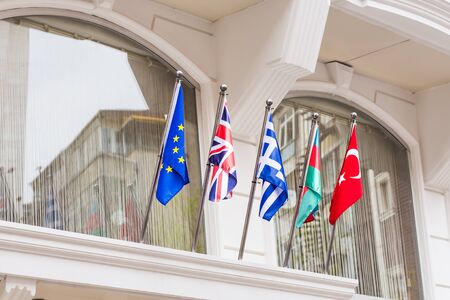 flags on the roof of the building in Turkeyの写真素材
