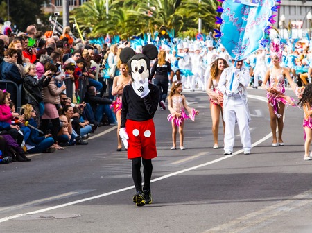 TENERIFE, FEBRUARY 17: Carnival groups and costumed characters, parade through the streets of the city. FEBRUARY 17, 2015, Tenerife (Canary Islands) Spainのeditorial素材