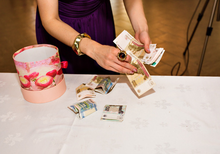 Female hand with  money Russian rouble. financial crisisの写真素材