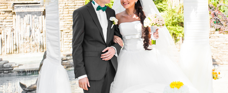 Bride and groom close up at wedding ceremonyの写真素材