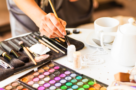 makeup cosmetics. compact powder, mineral foundation and makeup brushes.の写真素材